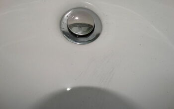 Black scratch marks on sink