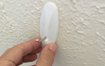 How to get command strip hangers to attach to a textured bathroom wall