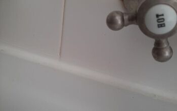 Should you use grout or caulk around a bathtub?