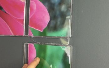 Use Your Old CD Cases for Creative Wall Art